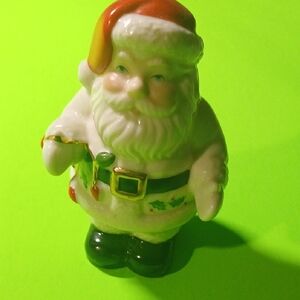 Festive Santa Claus Figurine - Red, Green, Black, White
